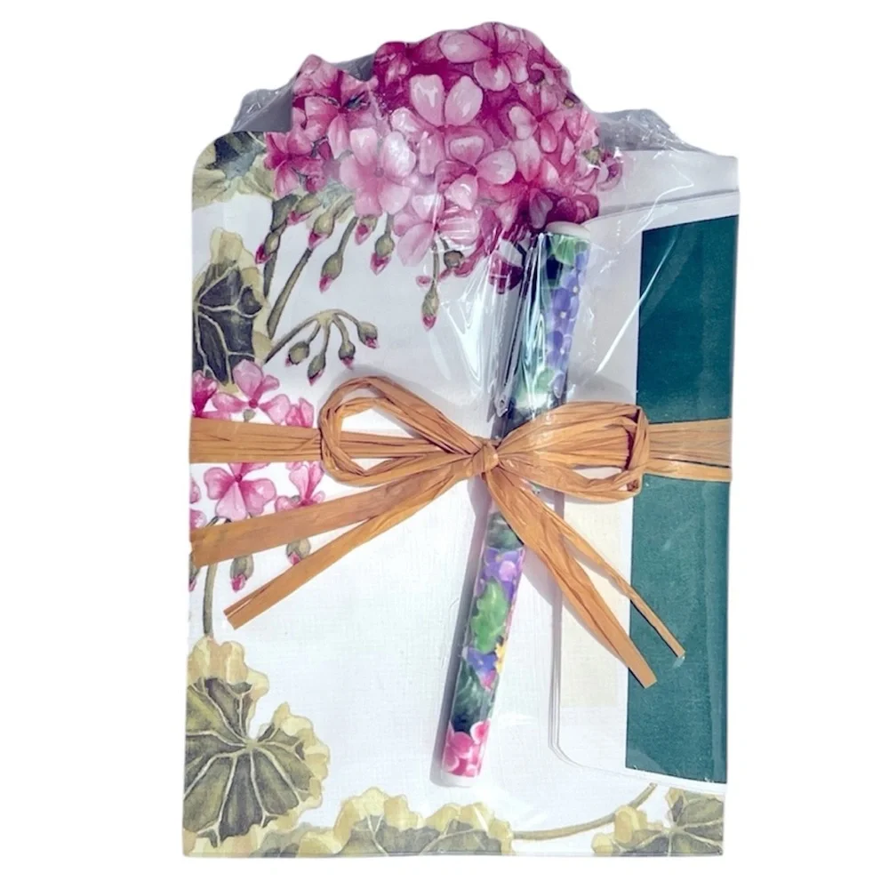 Floral Notepad, 8 Envelopes, and Designer Pen.  New in Packaging.